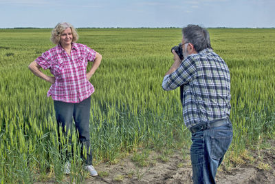 Full length of a man standing in farm