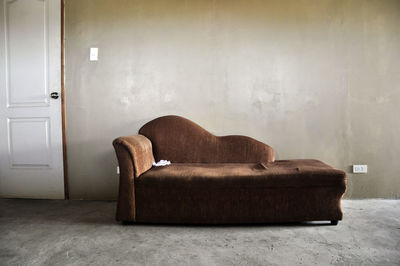 View of sofa against the wall