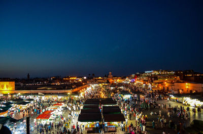 High angle view of illuminated city at night