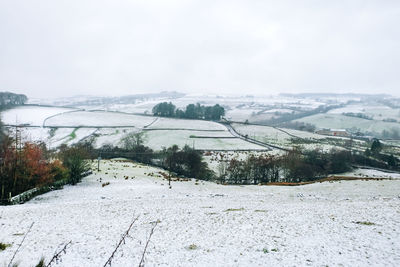 Scenic view of mountains against sky during winter