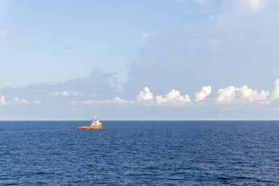 An anchor handling tugboat maneuvering at offshore terengganu oil field