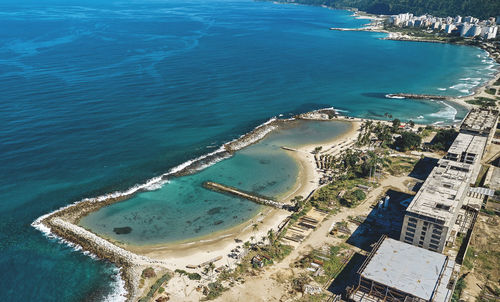 Aerial view the old beach and structure of the macuto sheraton hotel built in 1961