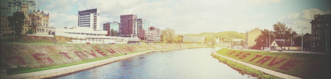 View of buildings against cloudy sky