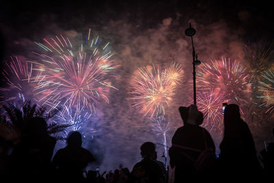 Firework display at night