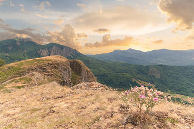 Scenic view of mountains against sky during sunset