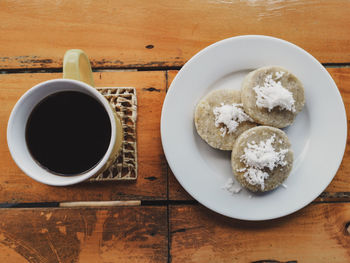 Directly above shot of coffee served on table