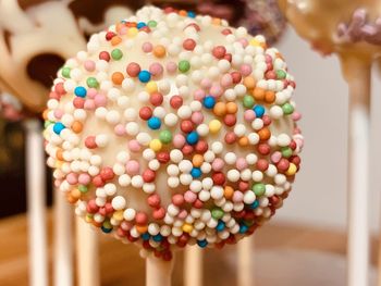 Close-up of multi colored candies cake pop