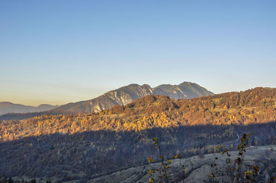 Scenic view of mountains against clear sky