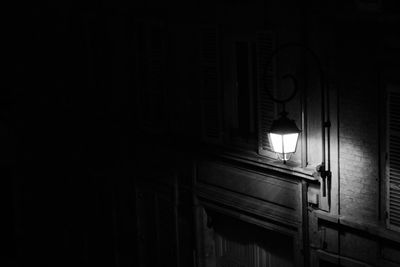 Low angle view of illuminated light bulb