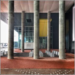 Empty parking lot by building