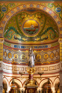 View of ornate ceiling of building