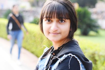 Portrait of smiling woman outdoors