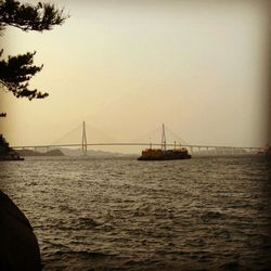 Suspension bridge over river