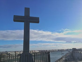 Cross against sky