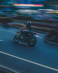 Blurred motion of car on street