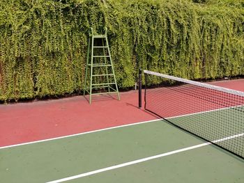 High angle view of net and ladder on tennis field