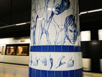 Graffiti on train at subway station