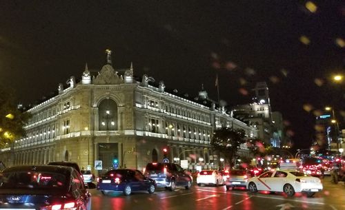 Traffic on road in city at night