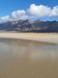 Scenic view of land against sky