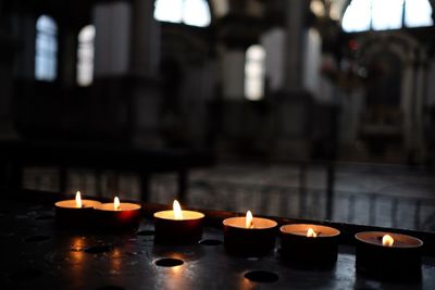 Lit tea light candles