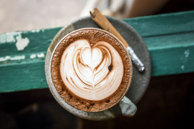 Close-up of coffee cup on table