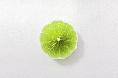 Close-up of apple against white background