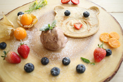Close-up of cake served on table