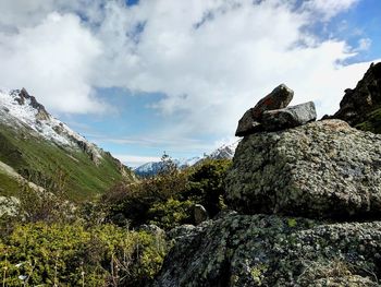 Panoramic view of rocks and trees against sky