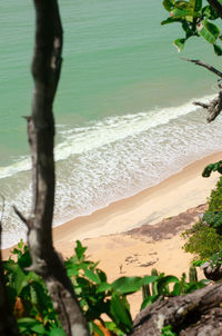 Scenic view of beach by sea