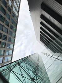 Low angle view of modern buildings against sky
