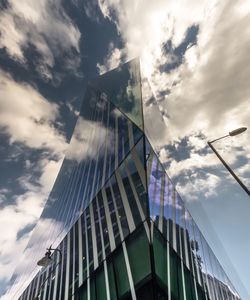 Low angle view of modern building against sky