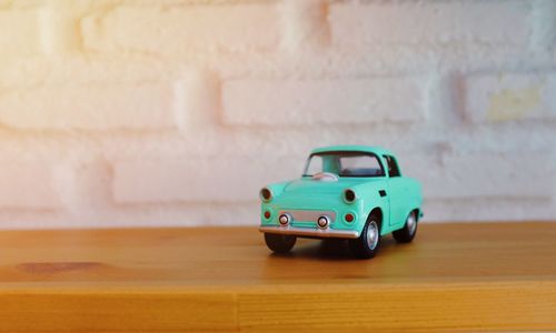 Close-up of toy car on table at home