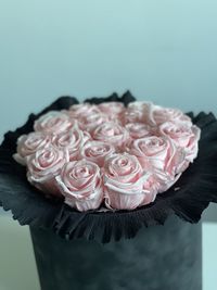 Close-up of pink roses against white background