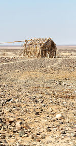 Built structure on land against clear sky
