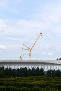 View of bridge against cloudy sky