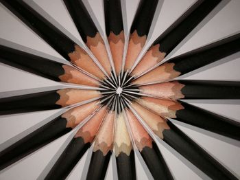 Full frame shot of pencils arranged on white background