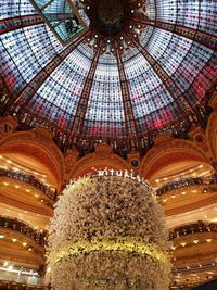 Low angle view of illuminated chandelier