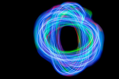 Light painting against black background