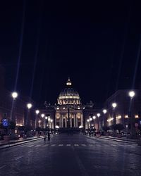 View of illuminated building against sky at night