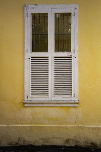 Closed window of old building