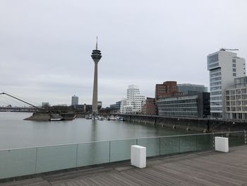 Modern buildings in city against sky