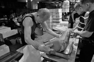 People working in kitchen