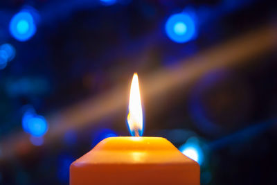 Close-up of burning candle