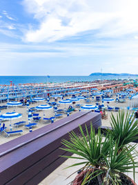 Beach umbrellas against sky