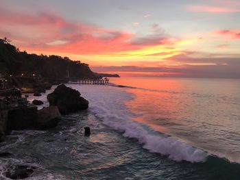 Scenic view of sea against sky at sunset