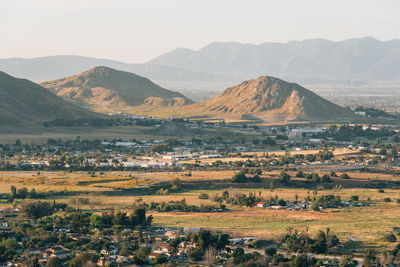 Scenic view of landscape and mountains against sky