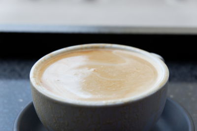 Close-up of cappuccino on table