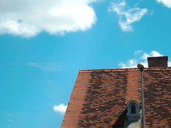 Low angle view of roof against sky