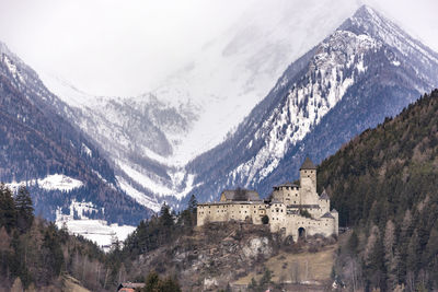 Panoramic view of buildings on mountain against sky