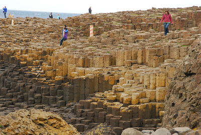 Woman standing on rock
